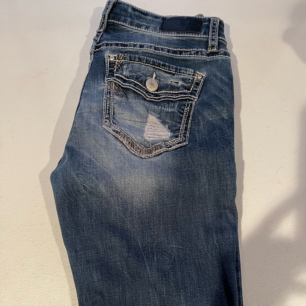 Women Buckle Jeans